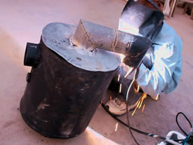 Welding Rocket Stove Space Heater from Recycled Steel Parts