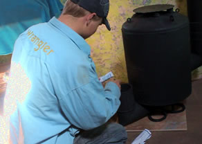 Building a small fire in the homemade rocket stove